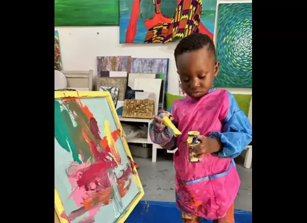 A toddler from Ghana becomes the youngest male artist in Guinness World Records, with his paintings selling quickly.