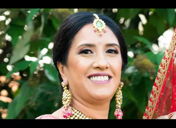 Airport worker suffers permanent brain injury after being pulled into conveyor belt while handling luggage.