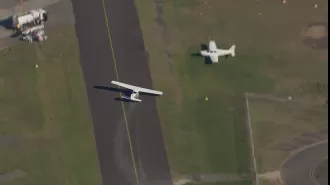 Small aircraft safely lands at Bankstown Airport after experiencing problems.