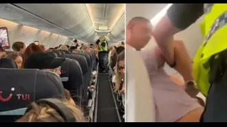 A man was forcefully removed from a TUI flight for attacking staff and refusing to surrender a bottle of gin.