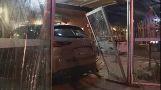 A car crashes into a Melbourne building that used to belong to Franco Cozzo.