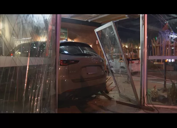 A car crashes into a Melbourne building that used to belong to Franco Cozzo.