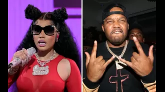 Nicki Minaj warns she will fire her DJ after he autographs a fan's chest.