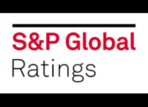 India's rating outlook upgraded to positive by S&P due to economic growth and increased government spending.