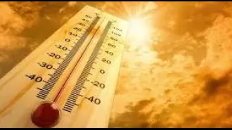 Delhi's temperature reaches record high of 52.3°C.
