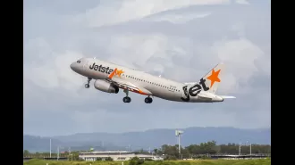 Jetstar flight attendants hospitalized due to strange odor on aircraft.