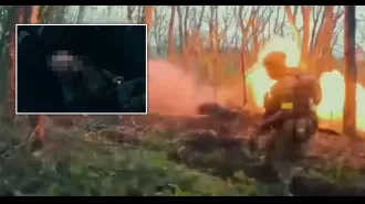 Ukrainian soldiers provide aid and cigarettes to Russians following intense battle.