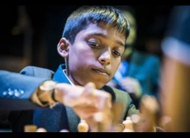Young chess prodigy Praggnanandhaa scores first major victory against reigning world champion Carlsen at Norway chess tournament.