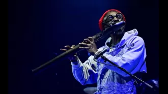 André 3000 ends Atlanta Jazz Festival with 'New Blue Sun' performance.
