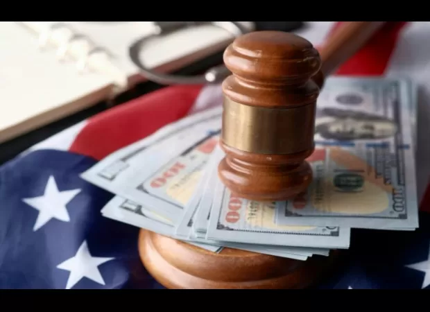 Man falsely confessed to father's murder, awarded $900K by police.