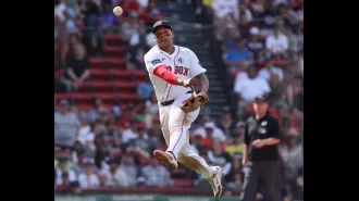 The Red Sox fall to the Tigers 8-4 in extra innings, despite a strong performance by Rafael Devers.
