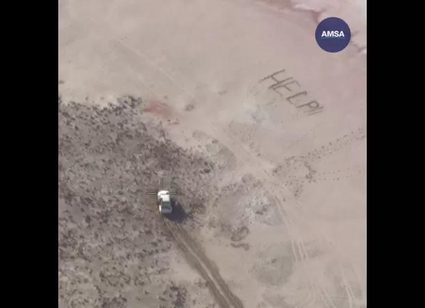 A group of stranded teenagers were saved after writing the word 