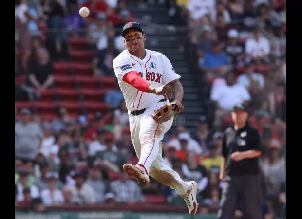 The Red Sox fall to the Tigers 8-4 in extra innings, despite a strong performance by Rafael Devers.