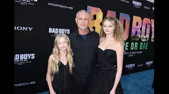 Famous 90s star's daughter looks just like her mother as she takes a photo on the red carpet.