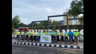 Kids and seniors participate in cycling event in the City.