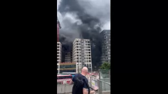 Massive smoke clouds seen at London flats after fire in city center.
