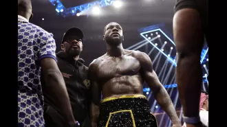 Wilder's mother urges him to retire from boxing after losing to Zhang.