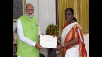 Modi resigns to Murmu.