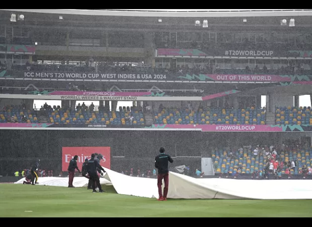 Scotland nearly topples England in World Cup T20, but rain prevents upset.