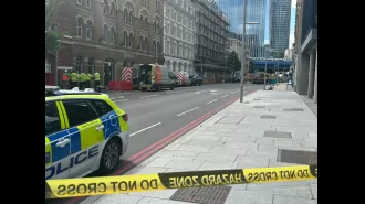 Large evacuation and cordoned off area in central London due to safety concerns.