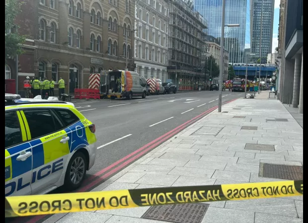 Large evacuation and cordoned off area in central London due to safety concerns.