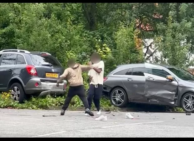 Driver attacks another with rock after car crash in road rage incident.