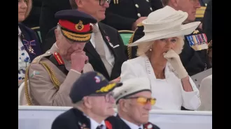 Queen touched by D-Day vet's stories, sheds a tear.