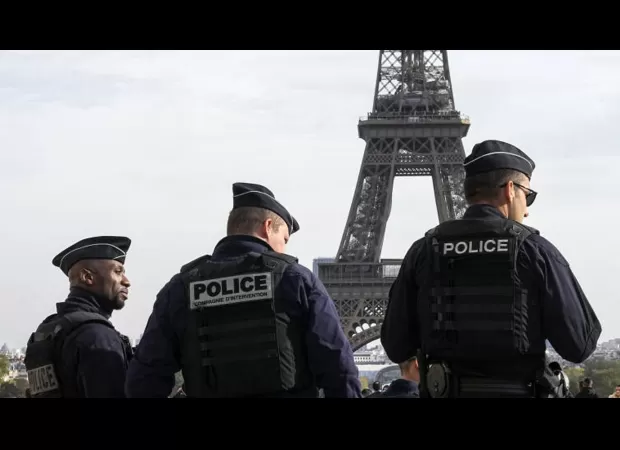 Bomb maker arrested near Paris after explosion in hotel room.