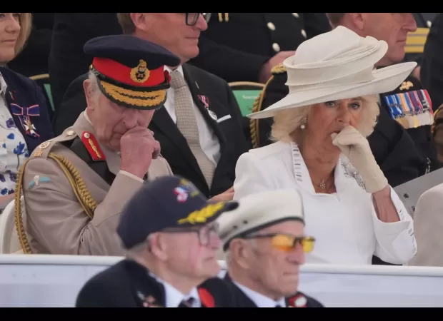 Queen touched by D-Day vet's stories, sheds a tear.