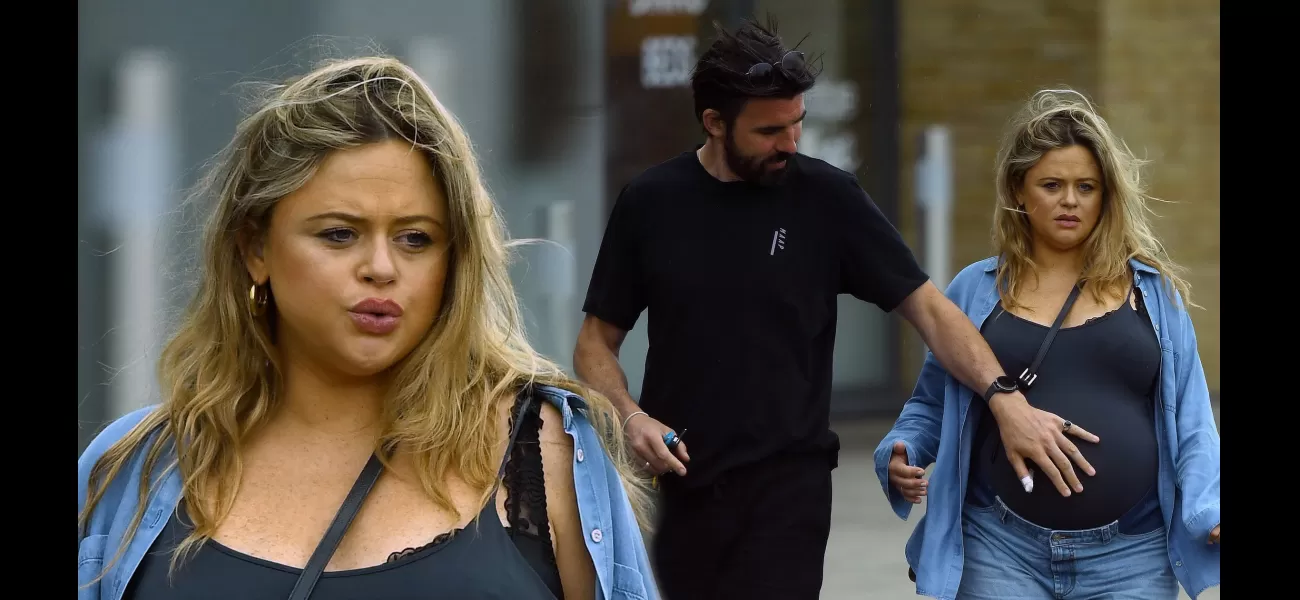 Expecting mom Emily Atack gets assistance from partner on walk before baby's birth.