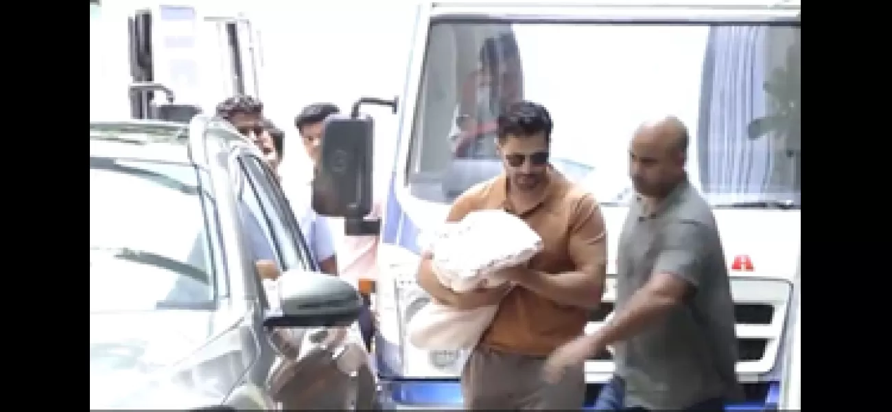 Varun Dhawan brings newborn daughter and wife Natasha home from hospital.