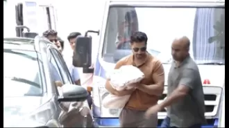 Varun Dhawan brings newborn daughter and wife Natasha home from hospital.
