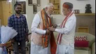 PM Modi meets with senior BJP leaders Advani and Joshi before taking oath for third term as prime minister.