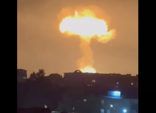 A gas explosion at a filling station creates a massive mushroom cloud in the sky.