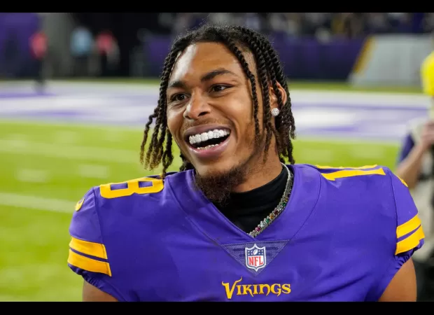 Justin Jefferson of the Minnesota Vikings signs record-breaking $140M contract, despite not being a quarterback.