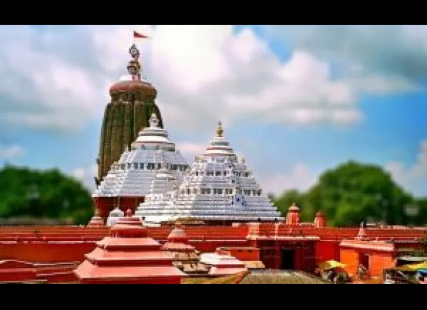 An unpaid contractor removes laser lights from Sri Jagannath temple in Puri.