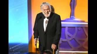 98-year-old Dick Van Dyke breaks record as the oldest person to receive a Daytime Emmy award, dancing on the red carpet.