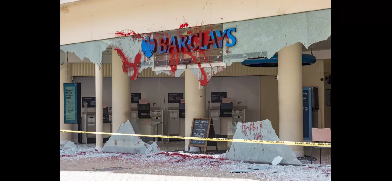 Protesters vandalize Barclays branches in UK with red paint.