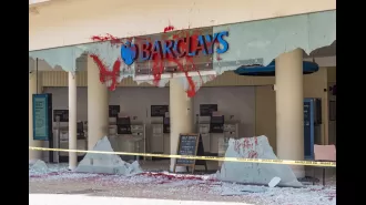 Protesters vandalize Barclays branches in UK with red paint.