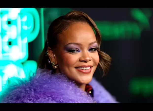 Rihanna shows off her natural hair while promoting Fenty Hair.