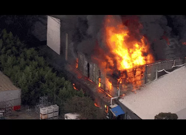 Massive blaze consumes manufacturing plant in the southern part of Sydney.