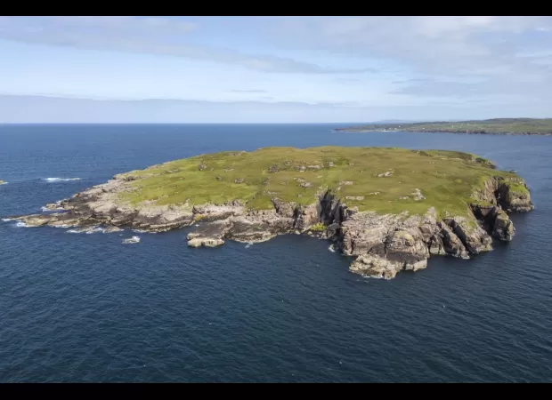 Remote Scottish island for sale, no neighbors except for kittiwakes, priced at £500,000.