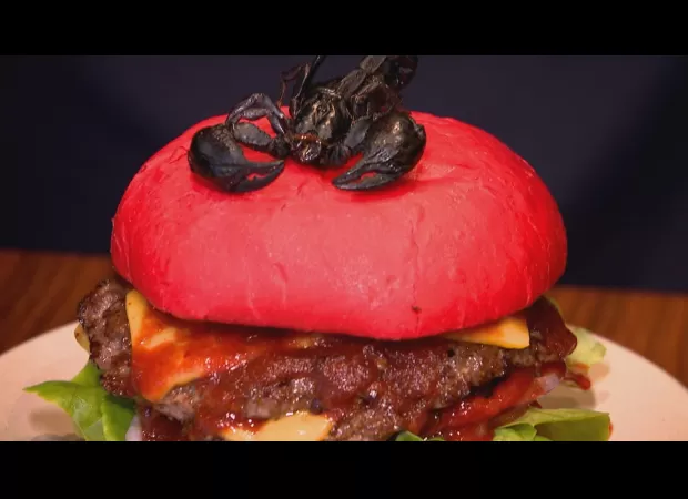 Get ready for our spiciest burger yet - it's topped with a scorpion and requires a waiver!