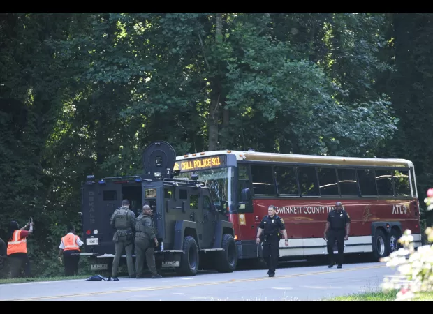 Police chase on US bus ends in shooting, one person killed during peak hour commute.