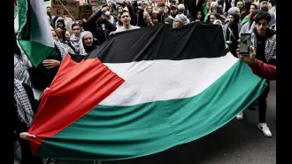 Video captures banker's violent reaction in Israel-Gaza dispute.