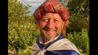 A Scottish soccer supporter whose life was saved by an opponent now has 