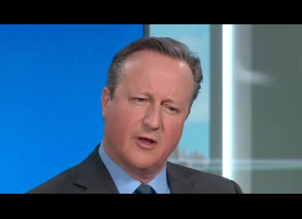 David Cameron surprises audience by quoting viral joke from Gino D'Acampo, creating a surreal moment.