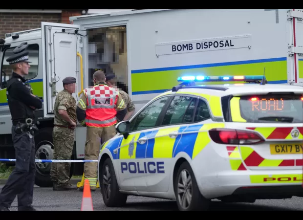 Police investigating potential threat at Conservative Party headquarters due to suspicious package.