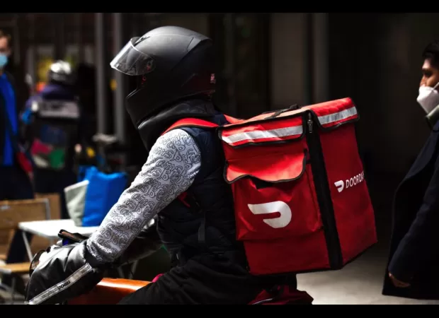 A DoorDash driver was terminated for using racist language in a video that went viral.