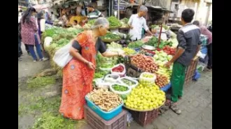 May's wholesale inflation hits 15-month high at 2.61% due to heatwave driving up food prices.